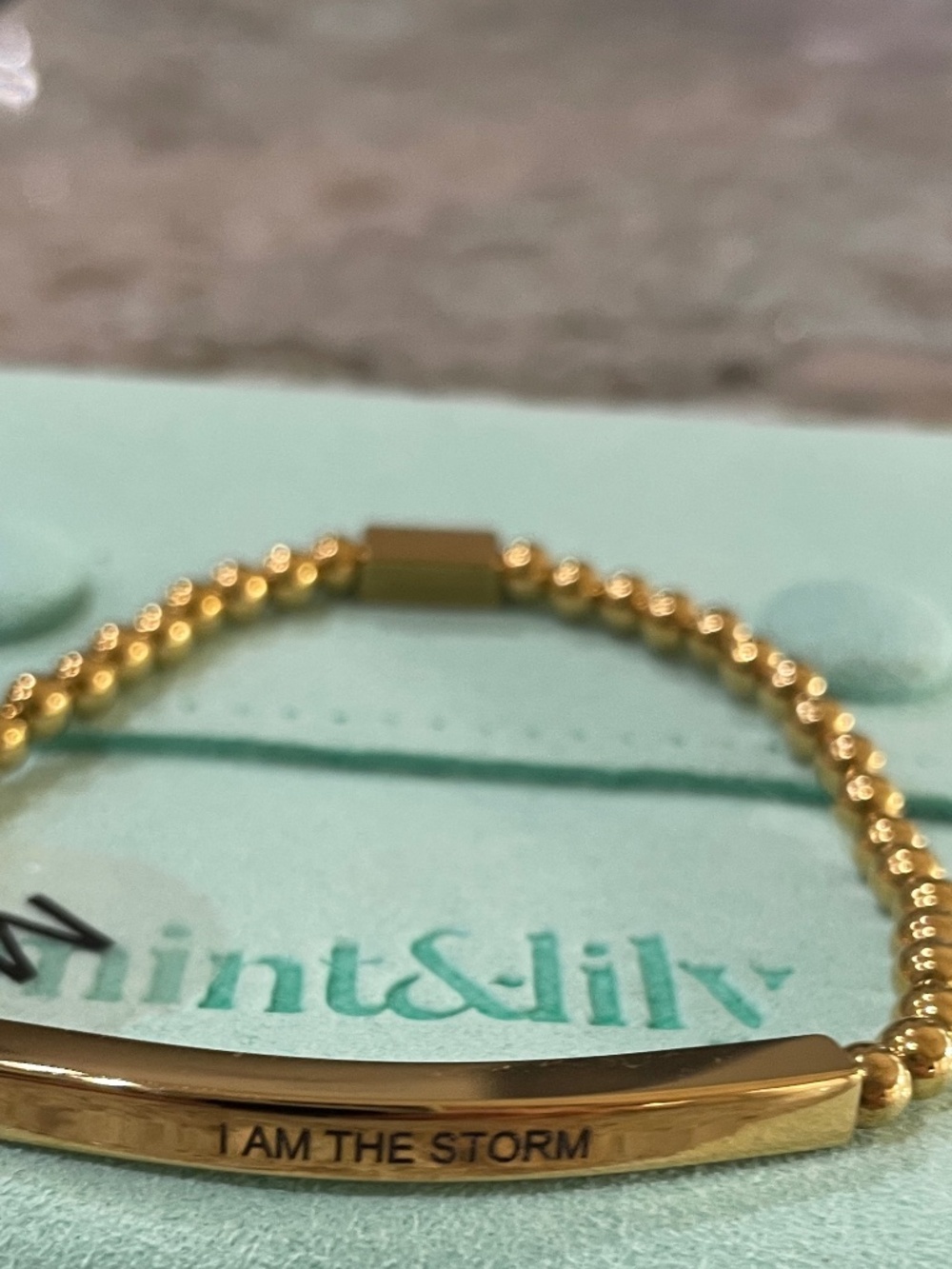 "I am the storm" MINT&LILY inspiration bracelet goldtone stretch